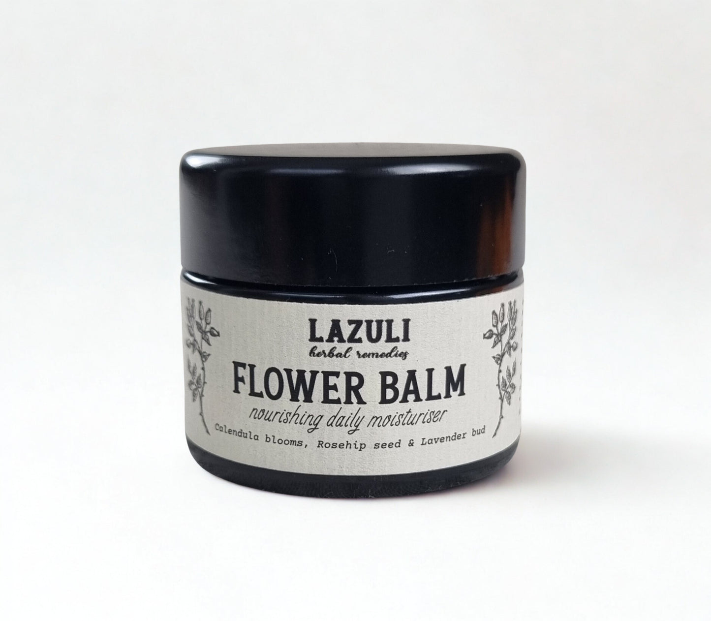 Jar of Lazuli Flower Balm on a white background