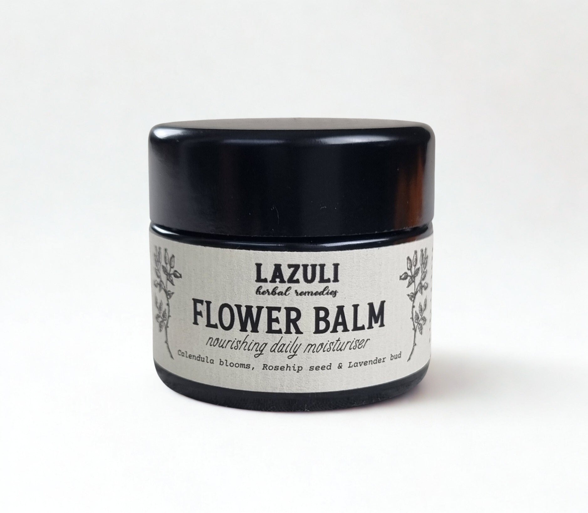 Jar of Lazuli Flower Balm on a white background