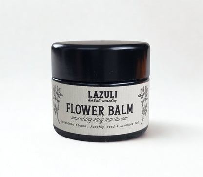 Jar of Lazuli Flower Balm on a white background