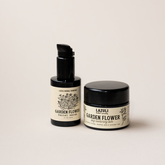 Two Lazuli Garden Flower skincare products on a light beige background
